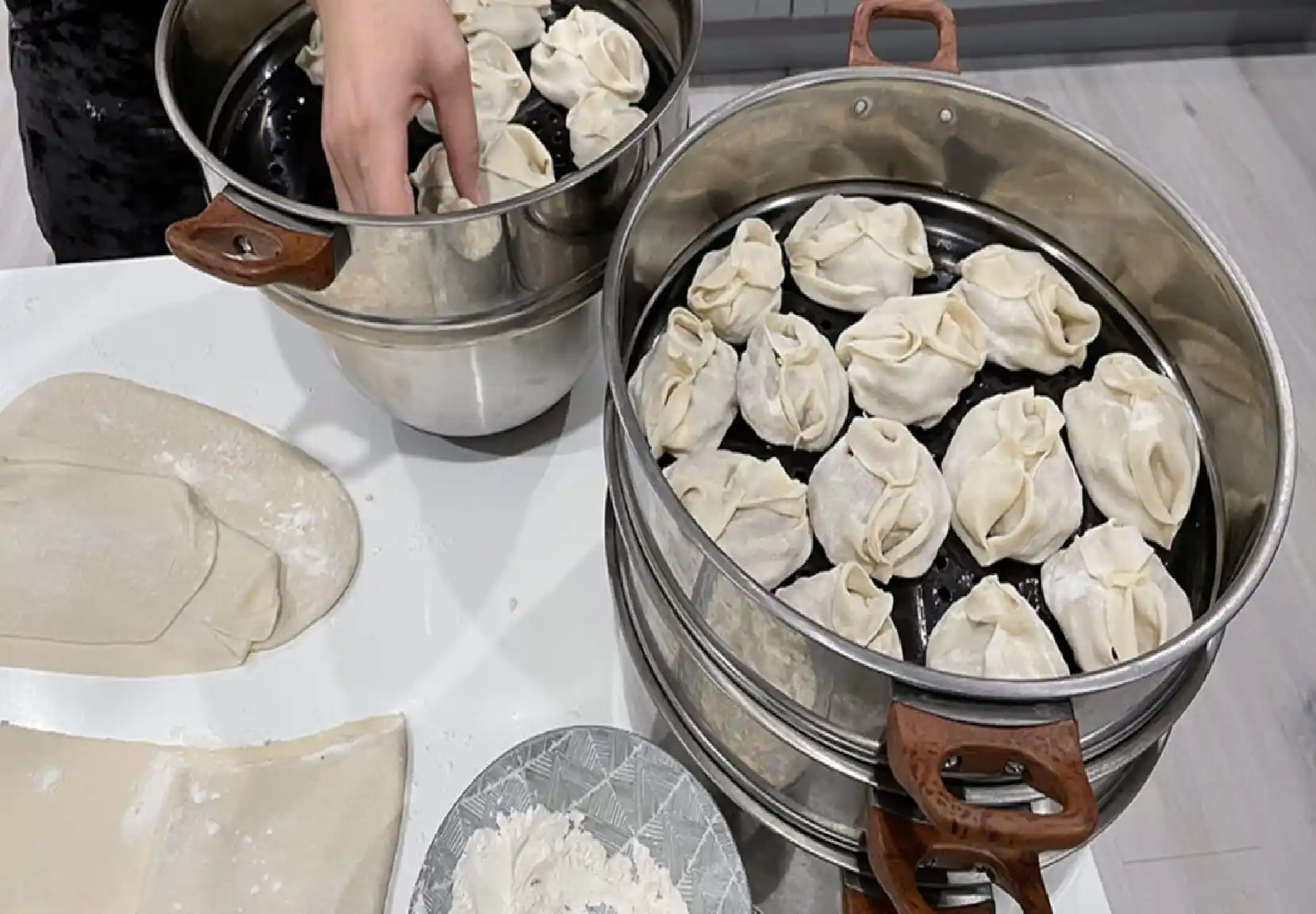 Traditional Afghan Mantoo dumplings with yogurt sauce